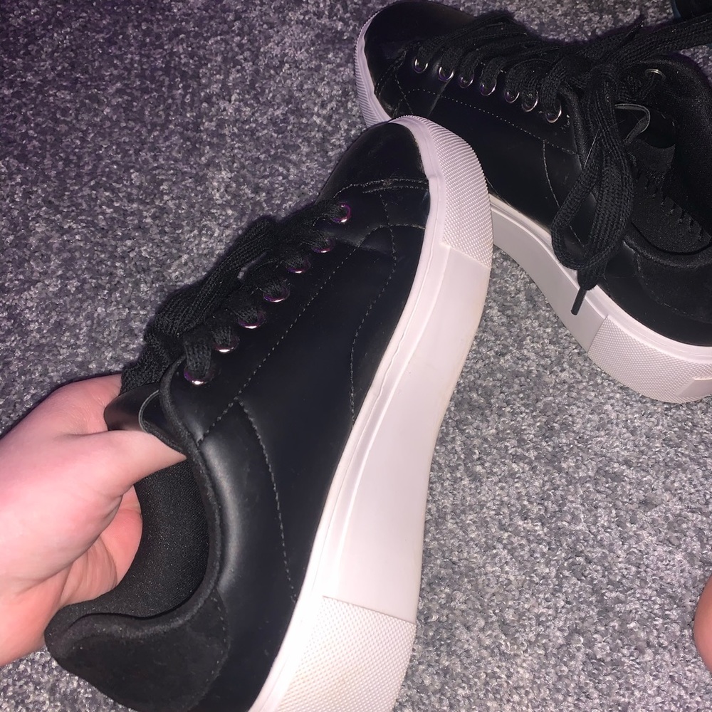 black leather sneakers